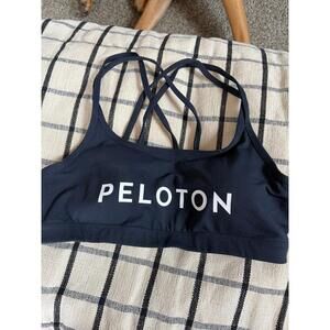 Peloton black sports bra strappy back size M. Removable pads
